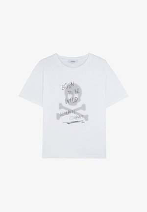 White cotton t-shirt featuring a gray skull graphic with crossbones and text "BORN TO BE WILD SCALPERS COMPANY" below. Short sleeves, crew neck.