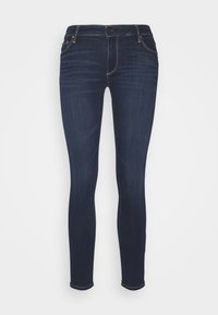 Tmavě modré skinny džíny vyrobené z denimu, s klasickým pětikapsovým designem a béžovým prošíváním, s hladkou strukturou a slim-fit střihem.