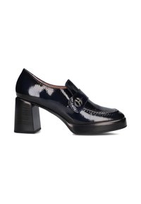 Navy patent leather block-heeled loafers with a rounded toe, decorative strap, and a circular metal accent on the strap.