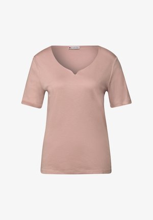 T-shirt rose clair à manches courtes avec un décolleté en V. Fabriqué en tissu doux au toucher lisse. Coupe simple et décontractée sans motifs ni accents.