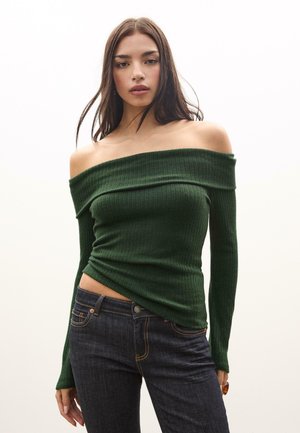 - Sweter