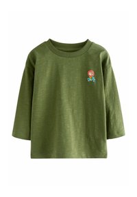 Grünes Baumwoll-T-Shirt mit Rundhalsausschnitt und kurzen Ärmeln. Verfügt über eine kleine Grafik eines Lions auf einem Roller, die dem Design ein spielerisches Detail verleiht.