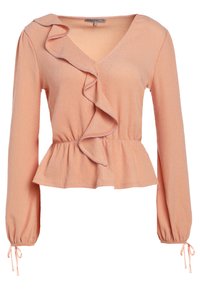 Blouse longue à manches longues couleur pêche avec col en V, détail volanté sur le devant, taille cintrée, bas évasé à paillettes et poignets noués.
