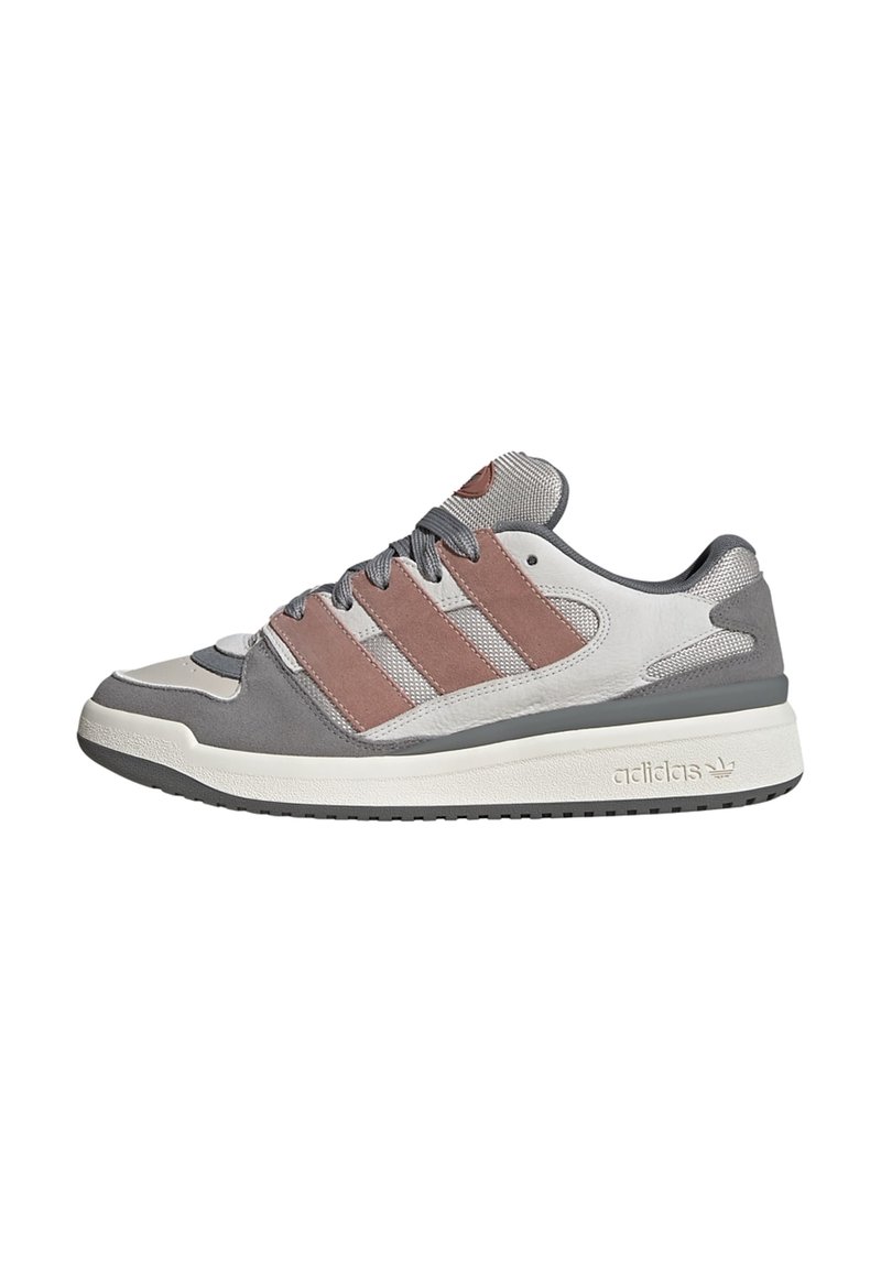 Sneaker with gray suede upper, white leather accents, and brown mesh stripes. Features padded tongue, rubber sole, and textured detailing.