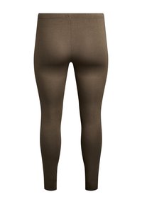 Braune Leggings mit glatter Textur, hohem Bund und einer engen Passform, die sich an den Knöcheln verjüngt. Hergestellt aus dehnbarem Stoff.
