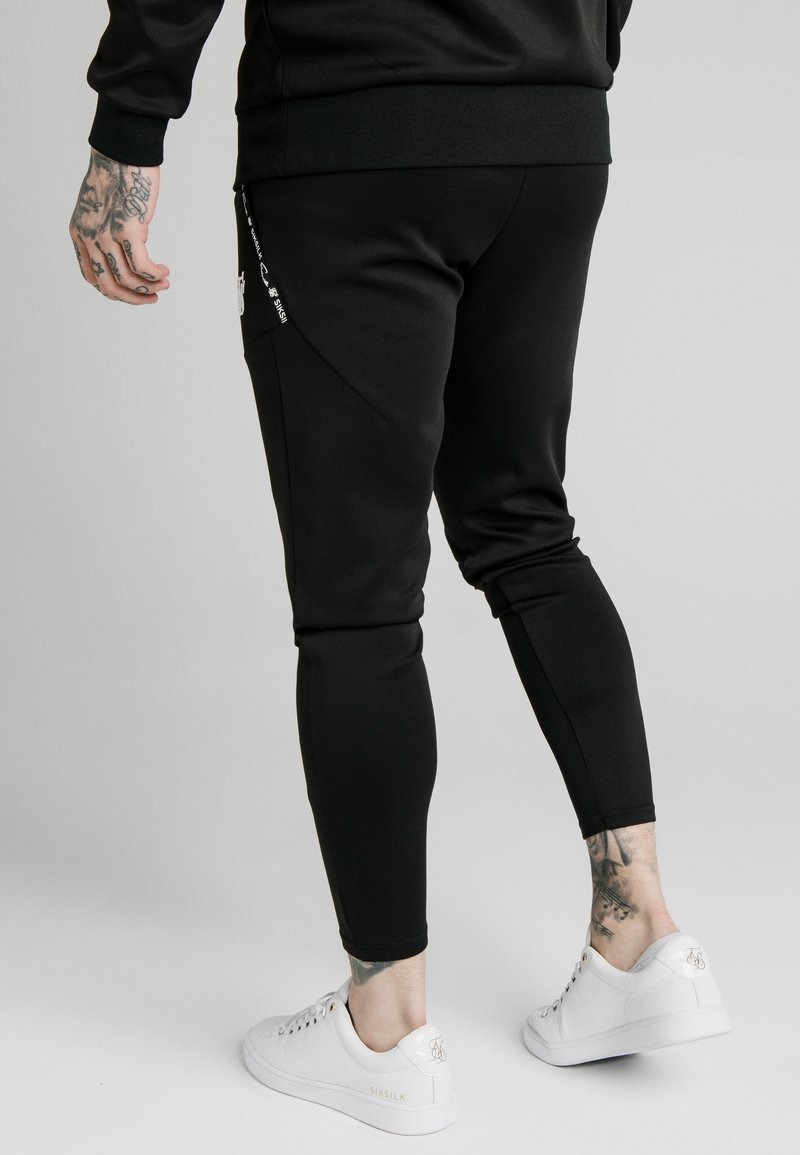SIKSILK Teplákové kalhoty - black
