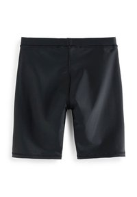 Shorts de bain noirs en tissu lisse et extensible. Dot�és d'une taille élastique et de coutures à plat pour un confort et une durabilité accrus.