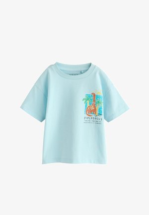 Light blue cotton t-shirt with short sleeves, featuring a colorful diplodocus graphic and tropical elements. "Diplodocus" text below design.