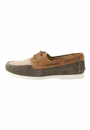 Men's casual boat shoe with beige, brown, and dark gray suede panels, lace details, and white rubber sole, side profile view.