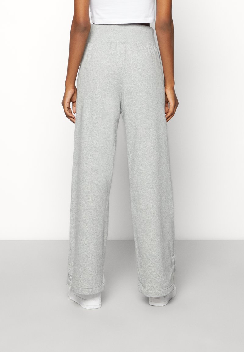 Nike Sportswear SPORTSWEAR PHOENIX FLEECE - Teplákové kalhoty - grey /sail