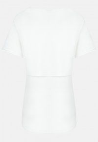 White short-sleeve T-shirt with a rounded neckline, featuring a layered design. The fabric appears smooth and lightweight.