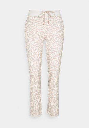 Roze en witte pyjamabroek met een compleet zebraprintpatroon, voorzien van een brede elastische tailleband en een koordsluiting.