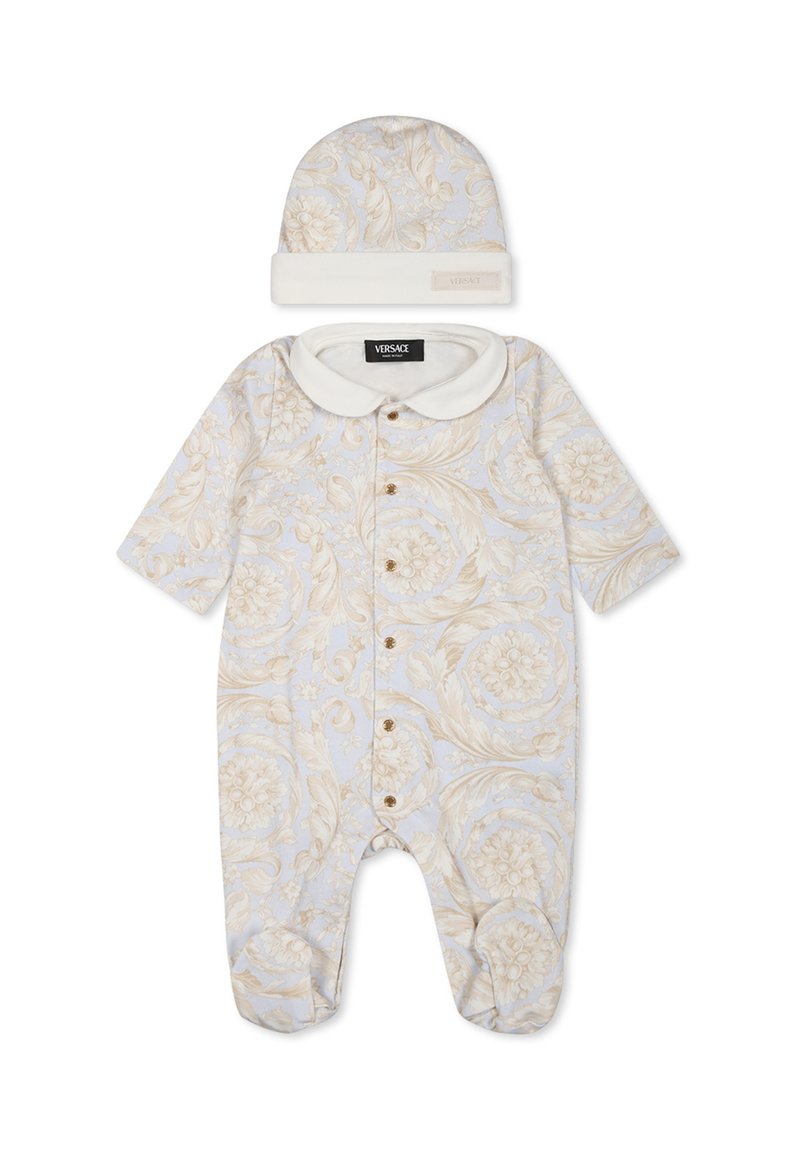 Body neonato azzurro chiaro con motivo floreale beige, maniche corte, colletto bianco e chiusura anteriore con bottoni. Include un cappellino abbinato.