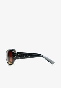 Black sunglasses with a bold, square frame. Gradient brown lenses and decorative silver accents along the arms. Smooth, glossy finish.