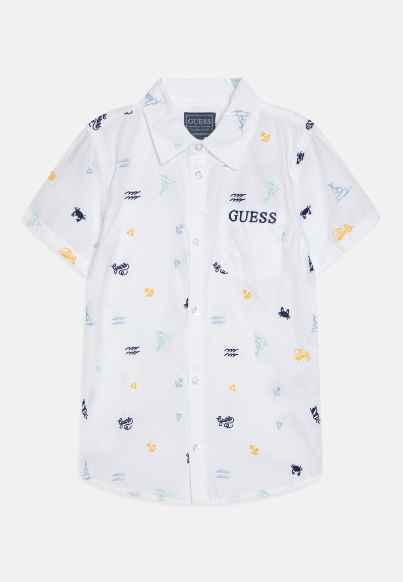 Camicia bianca a maniche corte con ricami nautici multicolore, dotata di colletto a pieghe e taschino sul petto.
