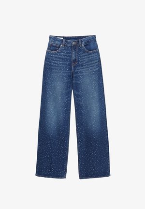 Široke jeans hlače v temno modrem denimu, z razpršenim vzorcem majhnih belih pik, standardnim petkim žepov in zapiranjem na gumb.
