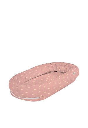 Soft pink baby nest with small white feather patterns, a padded cushioned edge, and a tag on the side.