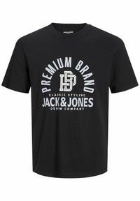 Juodas medvilninis marškinėlis su ryškiu baltu grafiniu tekstu: "PREMIUM BRAND JACK & JONES" su apvaliu dizainu ir klasikinis stilius.