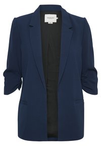 Blazer liviano de color azul marino con mangas cortas fruncidas, frente abierto, dos bolsillos frontales y textura de tela suave. Etiqueta de la marca visible en el interior.