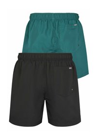 Pánske reverzibilné plavky, na jednej strane téhlová farba a na druhej čierna, elastický pás, zadná vrecko na oboch stranách s brandovými akcentmi.