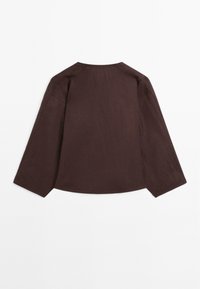 Chemise à manches longues marron foncé avec col rond, vue de dos sur un fond blanc uni.