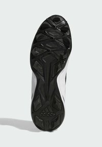 Crna guma potplat s teksturiranim grip uzorcima i heksagonalnim šiljcima. U središtu se nalazi Adidas brendiranje. Lagani, fleksibilni dizajn.