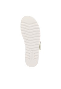 White sneaker sole with a wavy texture. Features a smooth finish and embossed branding, designed for comfort and flexibility.
