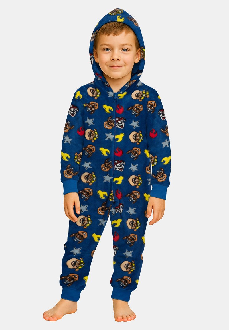Tuta blu in pile con cappuccio e chiusura a zip sul davanti. Il tessuto presenta volti di animali cartoni colorati, stelle e fiamme.