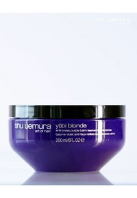Lila hårbalsambehållare, rund form, blanka svarta lock, märkt "yūbi blonde", 200 ml. Ger anti-brass fördelar för blont hår.