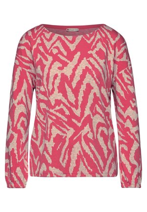Maglietta a maniche lunghe rosa con motivo zigzag astratto color crema; scollatura tonda, tessuto morbido e polsini arricciati sulle maniche.