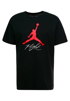 Camiseta de algodón negra con un gran logo rojo de Jumpman y la palabra "Flight" en un estilo de escritura blanca en el frente. Mangas cortas, cuello redondo.