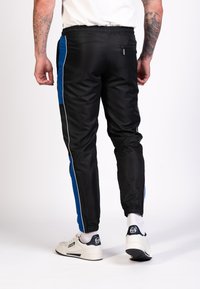 Sergio Tacchini ABITA PANTS - Jogginghose - black surf the web