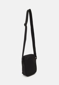 Tommy Hilfiger MINI REPORTER UNISEX - Borsa a tracolla - black