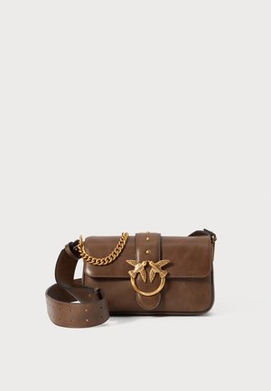 Brown leather crossbody bag with a gold chain strap, decorative bird motif, and stud accents, featuring a rectangular shape and smooth texture.