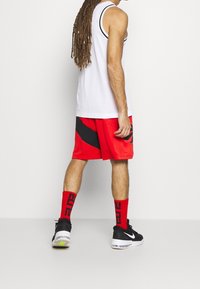Nike Performance Pantaloncini sportivi - red