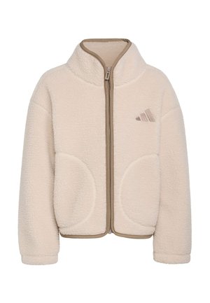 Veste polaire couleur crème avec fermeture éclair intégrale devant, col haut, poches latérales arrondies et logo discret sur la poitrine gauche.