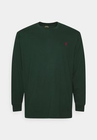 Long-sleeve dark green cotton t-shirt featuring a crew neck and a small red embroidered logo on the left chest.