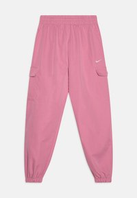 Ružové cargo nohavice s elastickým pásom, zhromaždenými manžetami a bočnými vreckami. Na prednej strane sa nachádza malé biele logo Nike.