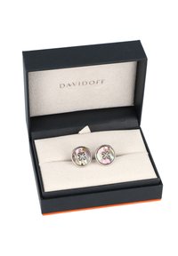 Silver cufflinks with a round shape featuring a floral design, set against an iridescent mother-of-pearl inlay, presented in a black box.
