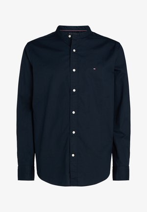Navy blue button-up shirt with a band collar, long sleeves, and white buttons; features a small logo on the chest. Cotton fabric.