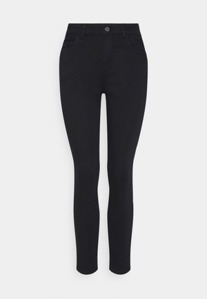 Pantalon skinny taille haute noir avec bouton avant et poches, présenté sur un fond uni clair.