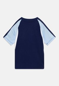 Navy blue short-sleeve t-shirt with light blue shoulder panels. Soft cotton material, crew neck, and a relaxed fit. Minimal design, no graphics.