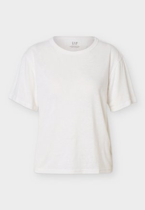 Fehér, rövid ujjú, kerek nyakú póló laza szabással és diszkrét GAP logóval a nyakkivágás belsejében.