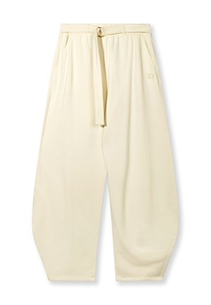 Pantalon fuselé de couleur crème avec passants de ceinture, ceinture en tissu à nouer, poches latérales et un petit détail brodé "10" sur le côté droit.