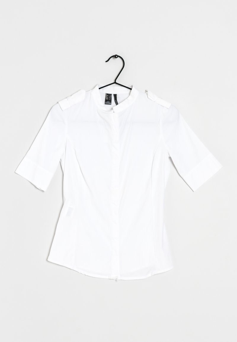 White short-sleeve blouse with a high collar, button front, and shoulder accents. Smooth fabric without patterns, minimalistic design.