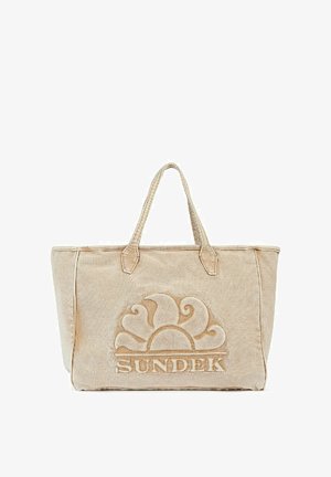 Sac fourre-tout beige avec deux poignées, tissu texturé, un design de nuage en relief bien visible, et le logo "SUNDEK" à la base.
