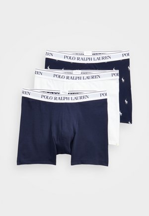 Három boxer alsónadrág: egy egyszínű sötétkék, egy egyszínű fehér, és egy sötétkék, amelyen ismétlődő ló logó található. Mindegyik márkázott rugalmas derékpánttal rendelkezik.