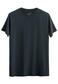 T-shirt nera a maniche corte realizzata in cotone morbido. Presenta un collo rotondo e una vestibilità rilassata, senza motivi o loghi visibili.