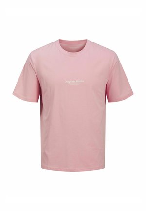 Light pink short-sleeve t-shirt made of cotton. Features a round neckline and "Originals Studio" printed in white across the chest.