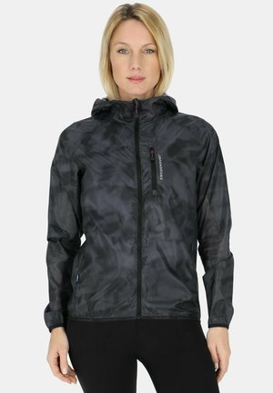 Black windbreaker jacket with a textured, layered design. Features a hood, full zipper, and purple accents on the zip pull and logo.